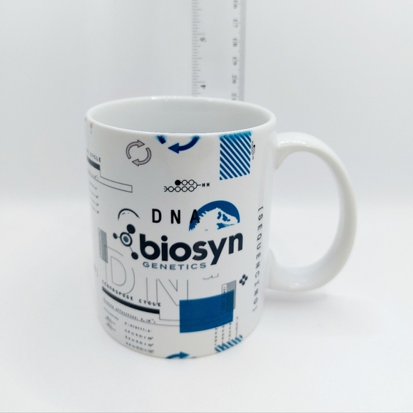 UNIVERSAL STUDIOS JURASSIC WORLD DN BIOSYN‎ GENETICS COFFEE MUG NEW WITH… - Picture 2 of 8